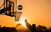 basketball playing shooting a 2022 ball into the hoop